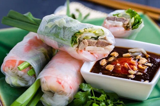 12 Tasting Street Food & Sightseeing By Scooter with Student - The Thich Quang Duc Monument and a serious pause