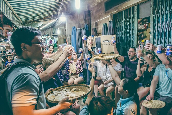 12 Tasting Street Food & Sightseeing By Scooter with Student - District 4 and Xom Chieu Market