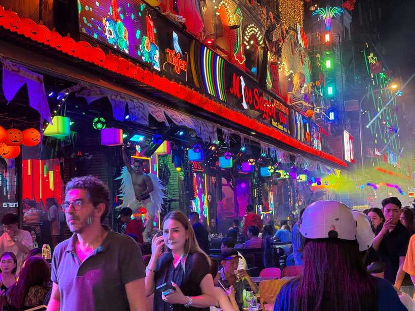 Acoustics Live Music And Saigon Night Life Street Food Tour - Walking through alleys after dark