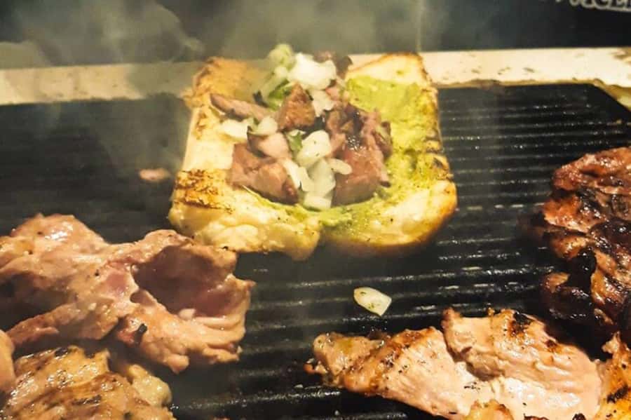 Antigua Local: Evening Street Food Tour with Dinner - Entering Mercado Municipal after dark