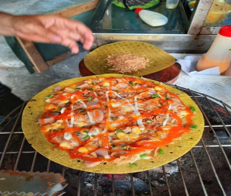 Authentic Walking Street Food Tour in Ho Chi Minh City - Starting in District 1 and heading off the main road