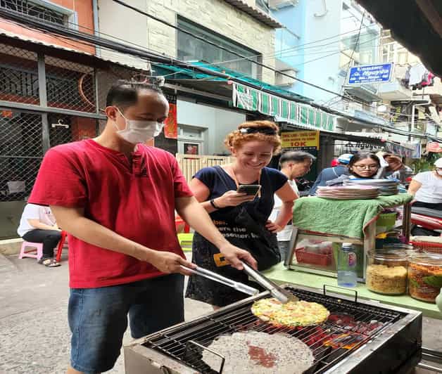 Authentic Walking Street Food Tour in Ho Chi Minh City - What the guide adds beyond the food