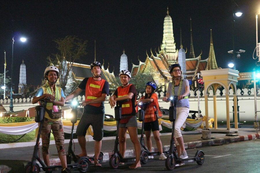 Bangkok: E-Scooter Night Tour with Local Street Food - Local lanes and Thonburi’s quieter side