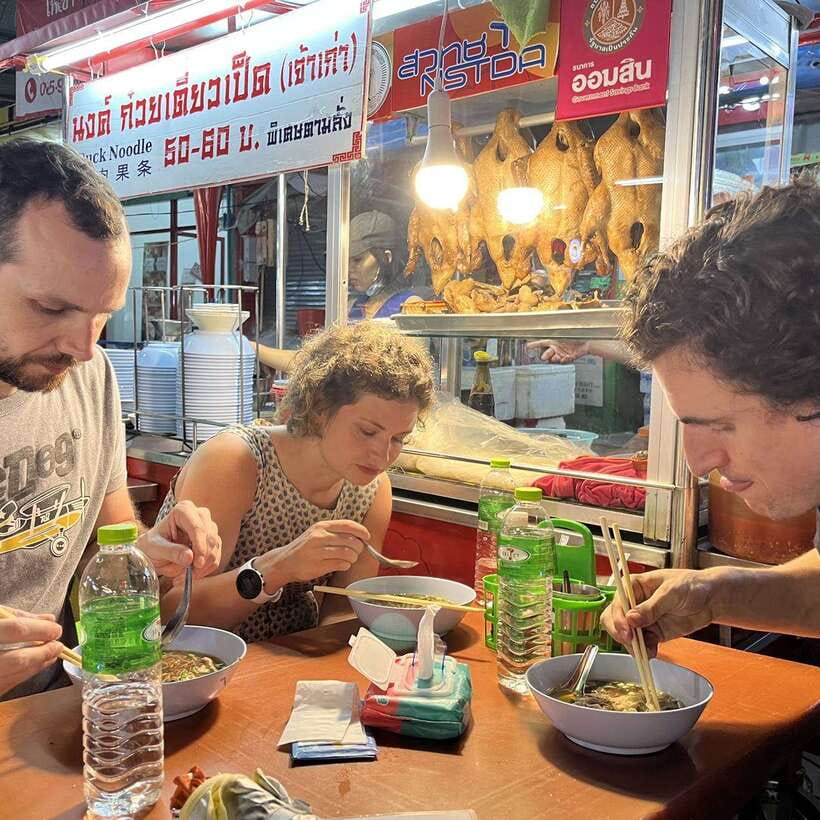 Bangkok: Street Food Tasting Tour at Night - Walking through Yaowarat after sunset