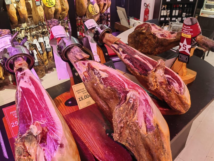 Barcelona: Local Market & Street Food Walking Tour - Tasting family-run foods along the Rambla