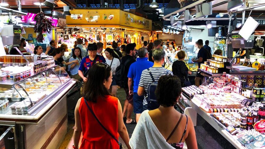 Barcelona: Street Food & Sightseeing Tour with Local Market - Tasting jamón, tapas, and Catalan sweets