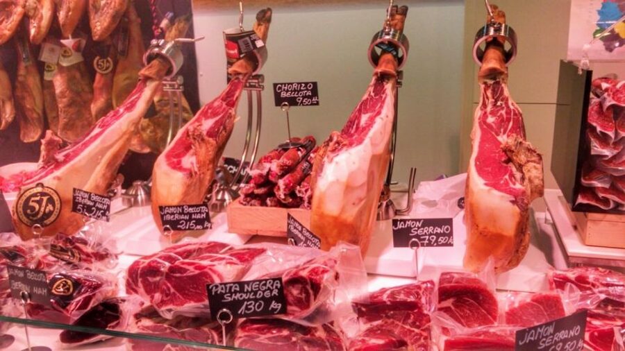 Barcelona: Street Food & Sightseeing Tour with Local Market - Family-run stops and local eating habits