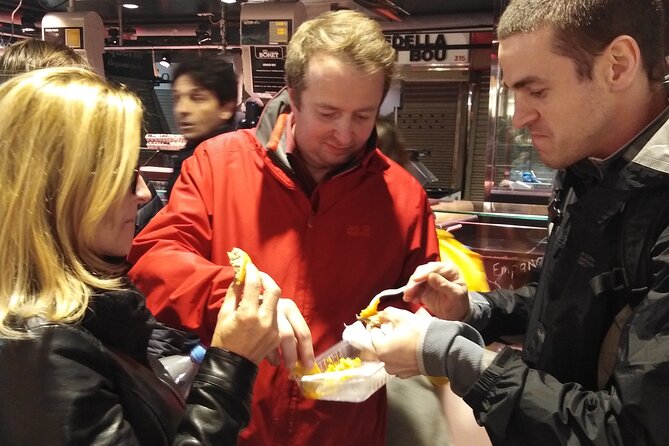 Barcelona Street Food Tour with Local Market & City Center Visit - Plaça del Rei and Barcelona’s older layers