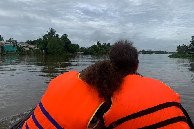 Boat tour on Mekong river see the sunset, small canal, Vegan dinner, street food - Can Tho Bridge, islets, and the smaller canals