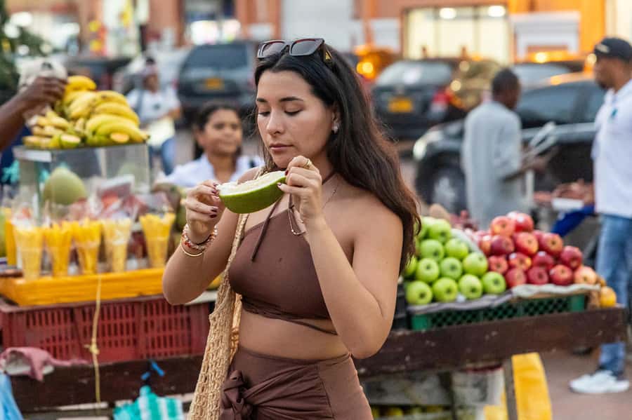 Cartagena: Guided Street Food Tour with Tastings - Starting beneath the orange umbrellas at Plaza Cervantes