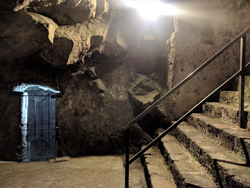 Catania: Underground and Street Food Walking Tour - Via Etnea, black lava stone, and buried churches