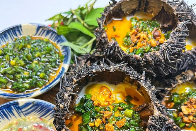 Da Nang By Night: Seafood dinner, night market and cruise trip - Riding through Da Nang with a local driver