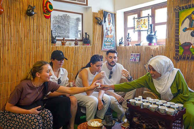 Dubai: Old Town, Souks, Street Food, Guided Tour & Abra Ride - Coffee, dates, and Emirati welcome at Al Khayma