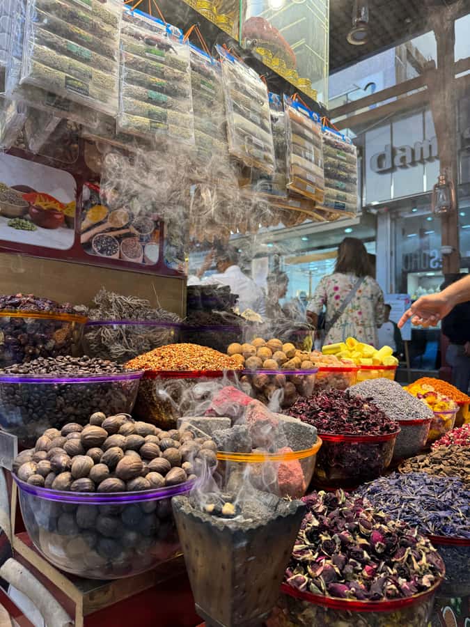 Dubai: Old Town Walking Tour with Abra Cruise & Street Food - Textile Souk: colors, browsing, and shopping advice
