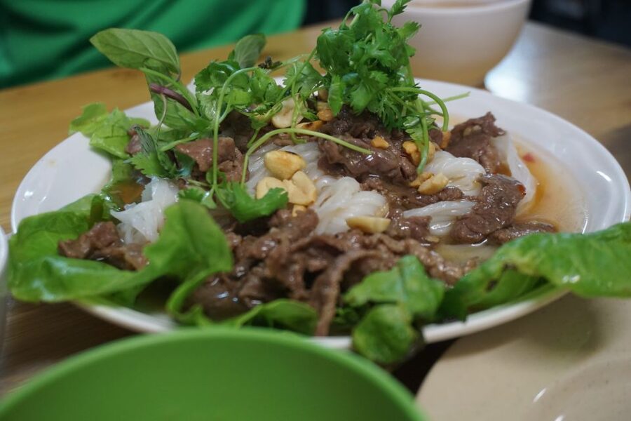 Enjoy Hanoi Like a Local - Vespa & Street Food Tour by Night - Ho Chi Minh Mausoleum after sunset