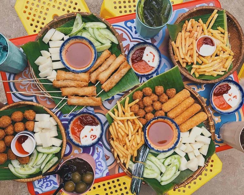 Enjoy Hanoi Like a Local - Vespa & Street Food Tour by Night - St. Joseph’s Cathedral and the first taste of Hanoi