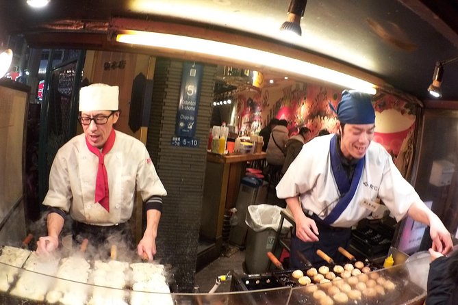 Evening Street Food Hopping Tour in Downtown Osaka - Gyoza, takoyaki, and ramen on the street