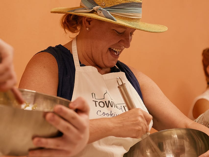 Florence: Cooking Class with Local Food Market Tour - Rolling pasta and building the meal