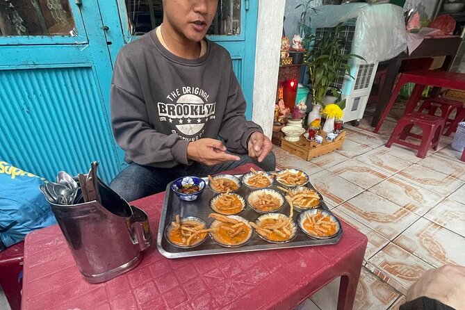 Half-day Private Street Food Tour in Hoi An - The 50-year banh mi stop at 115 Tran Cao Van