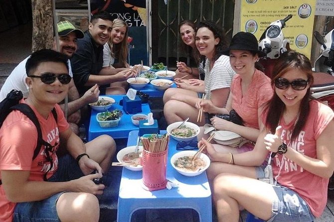 Hanoi City Street Food Night Tour by Motorscooter - Hanoi Opera House after dark
