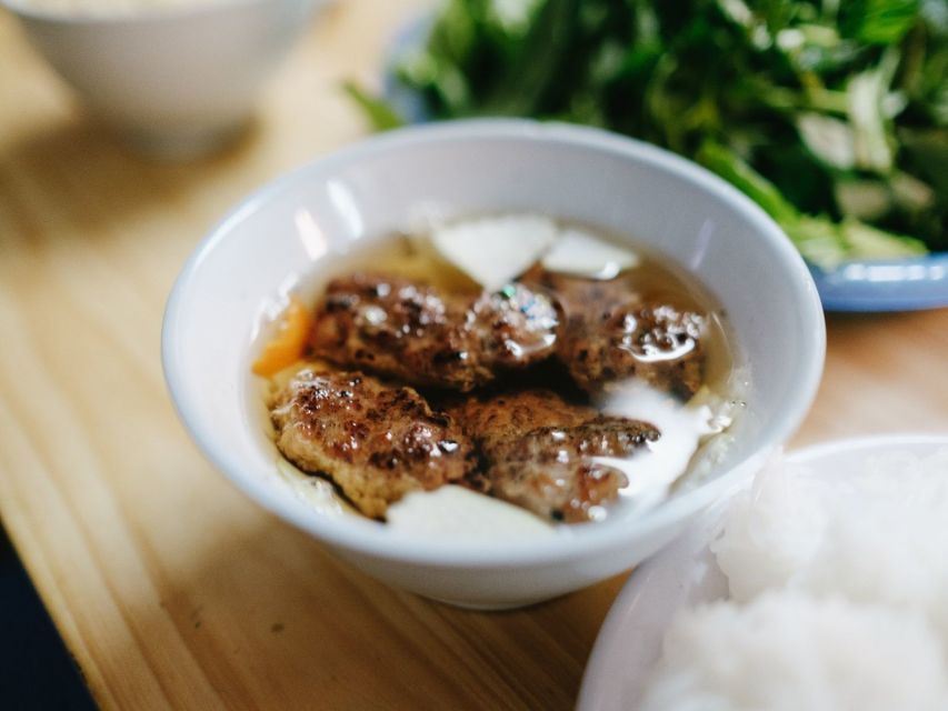 Hanoi: Street Food Experience with 5 Food Stops - Grilled nem chua and fruit keep the meal moving