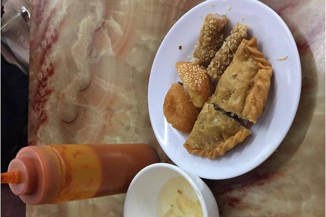 Hanoi Street Food + Night Life Tour - Seven stops, with both familiar and unusual dishes