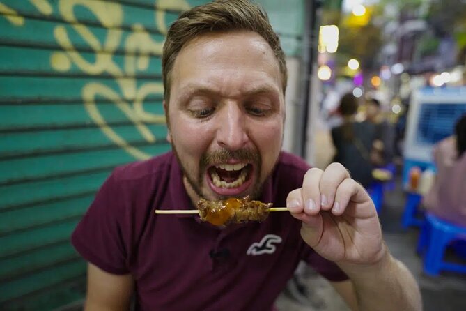 Hanoi Street Food Tour - Best Price - Walking through the Old Quarter between bites