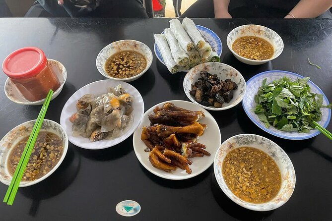Hanoi Street Food Tour by Motorbike or Walking with Local Guide - Phung Hung Mural Street and Hanoi in pictures