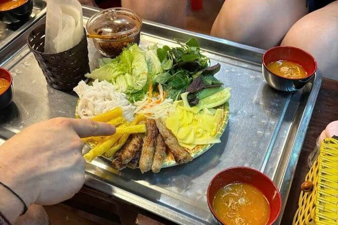 Hanoi Street Food Tour with egg coffee making - Banh mi, nem ran and pho rolls