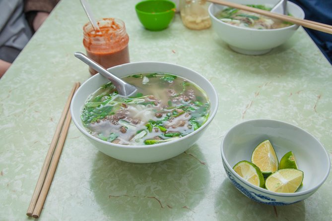 Hanoi Street Food Walking Tour and Water Puppet Show - Walking Hanoi’s 36 old trade streets