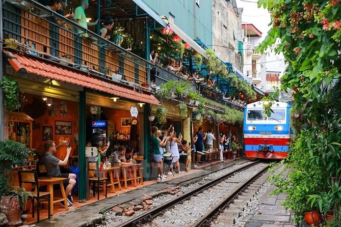Hanoi Train Street Food Walking Tour - Quan Chuong Gate and the first look at old Hanoi