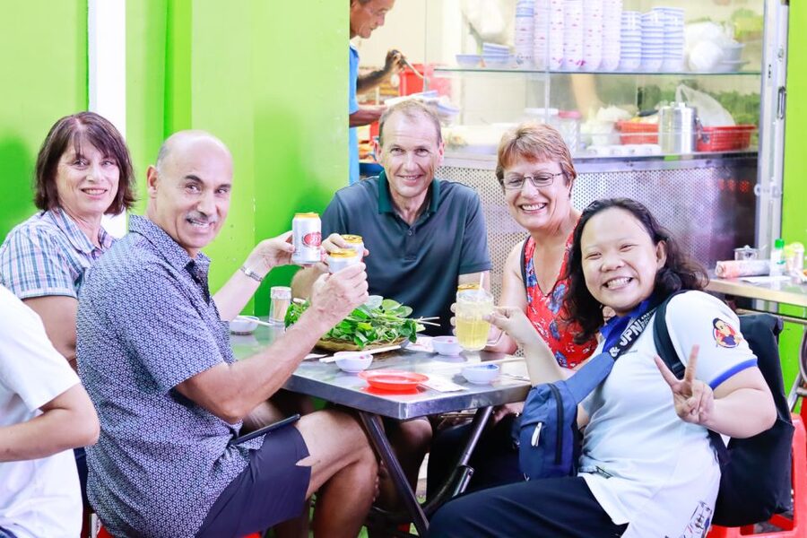 Ho Chi Minh City: Private Street Food Evening Walking Tour - Seafood alley and the banana rice wine stop