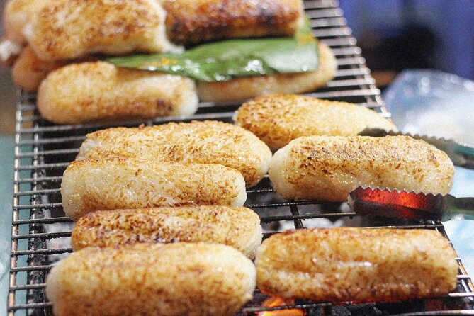 Ho Chi Minh City Street Food Tour & Sightseeing By Motorbike - Grilled banana and coconut in District 10