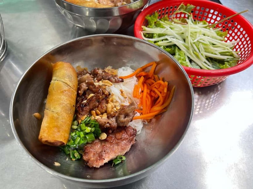Ho Chi Minh: Original Walking Street Food Tour with Foodies - From hotel door to first bowl of bo kho
