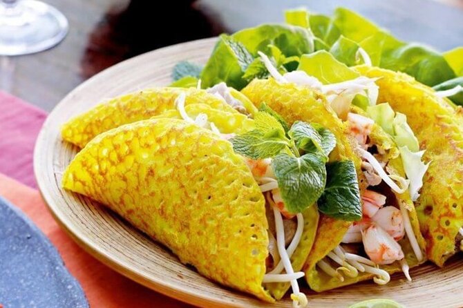 Hoi An Street Food Walking Tour with Local Foodies - Cơm gà brings a quieter, comforting course