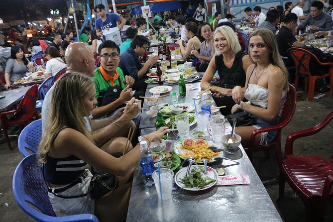 Hoi An Vespa By Night Street Food Tour - A boat to Cam Nam Island at sunset