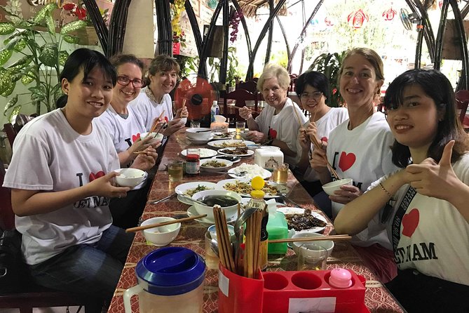 Hue Street Food Tour At Night By Scooter - Making your own rolled rice-paper snack