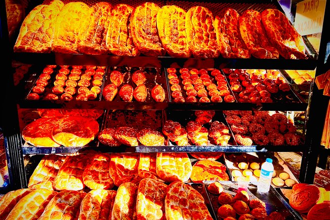 Istanbul Guided Street Food Tour Around European and Asian Sides - Fish wrap and Istanbul’s final sweet course