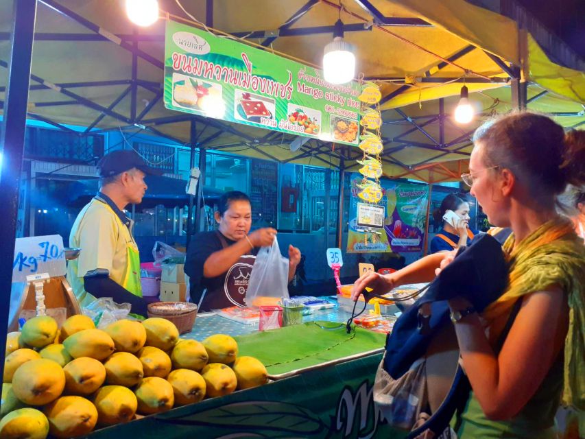 Krabi: Local Street Food Night Tour - The guide turns a snack stop into a local lesson