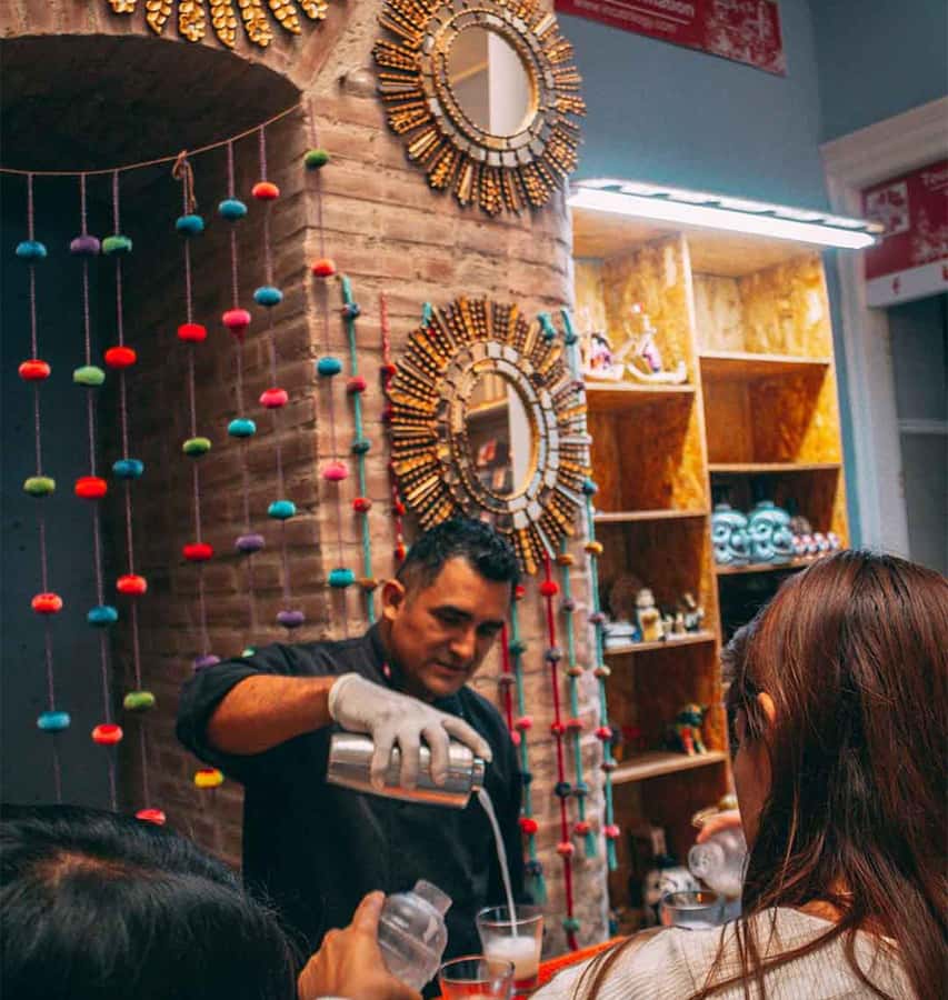 Lima: Street Food Tasting Tour with Pisco Sour Class - Colonial Lima between bites