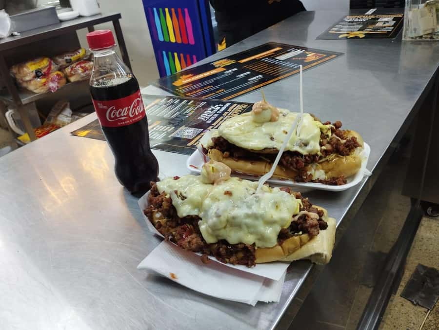 Medellin: tasting Street Food with Rooftops of El Poblado - Meeting above Los Patios Hostel