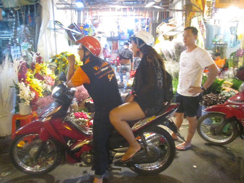 Midnight Street Food Tour In Saigon By Motorbike - Riding beside the Saigon River tunnels