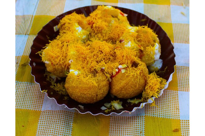 Mumbai Street Food Crawl (2 Hours Guided Food Tasting Tour) - Old shops, bright food, and local food stories