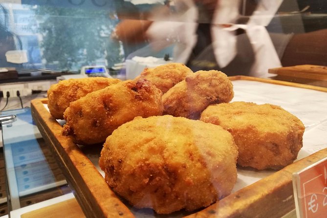 Naples Street Food Tour with a Native & Top Rated Expert - San Gregorio Armeno adds fried pasta and limoncello