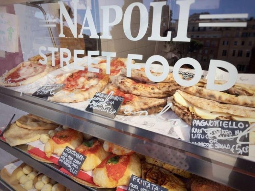 Napoli street food walking tour - Walking into the Quartieri Spagnoli with tarallo in hand