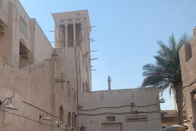 Old Dubai Walk, Souk, Street Foods, Al Fahidi and Al Seef Tales - Al Seef: camel statues, coffee, and a polished old-town setting
