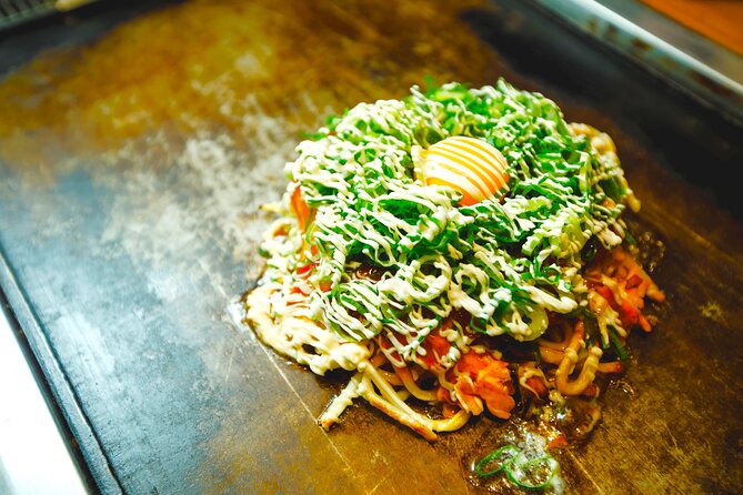 Osaka 2 Hour Local Street Food Tour in Dotonbori and Namba - Eating your way through 45 minutes in Dotonbori