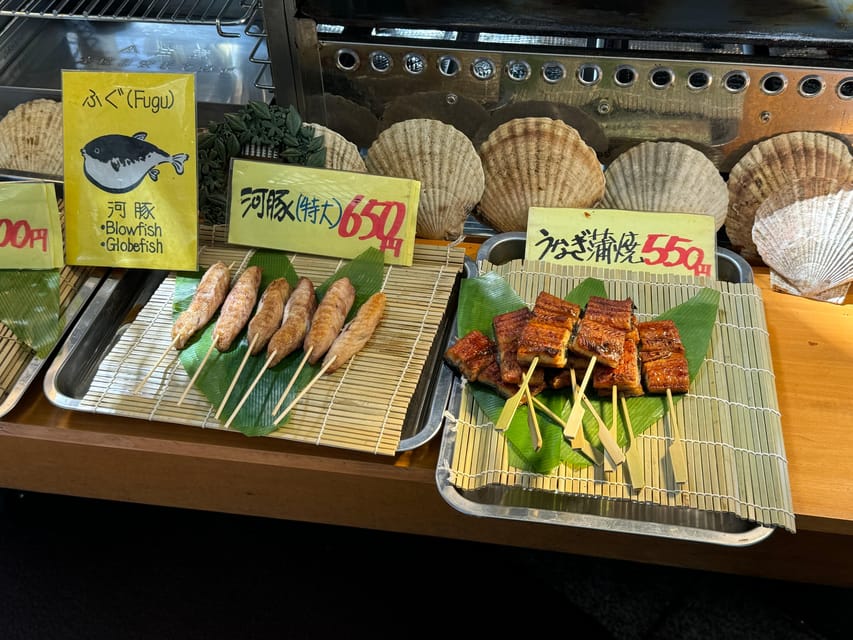 Osaka: Kuromon Market 1.5-Hour Seafood & Street Food Tour - Private tasting or small-group guidance?
