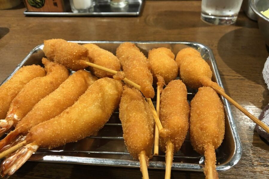 Osaka Shinsekai Street Food Tour - Evening - Kasu udon adds warmth to the evening