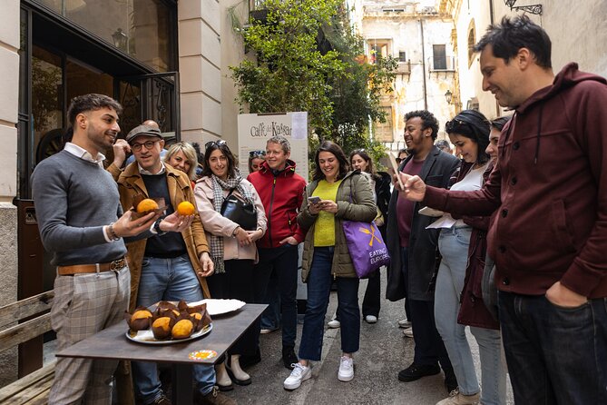 Palermo Street Food & Market Tour by Eating Europe - A fresh cannolo at I Segreti del Chiostro